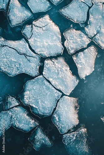 Ice formations creating patterns on a frozen lake during winter