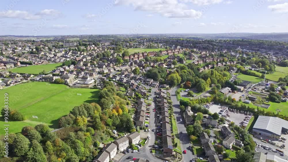 Aerial View of a typical UK town, suburb district sowing housing, gardens and roads. Aerial View of a typical UK town, suburb district sowing housing, gardens and roads.
