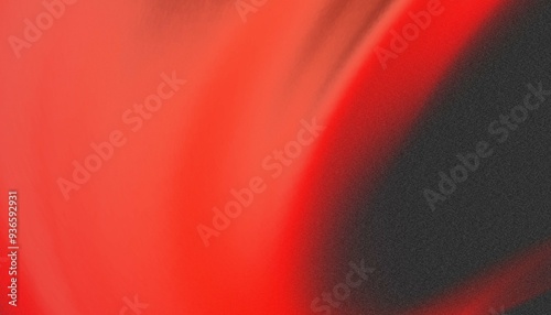 An abstract image with a smooth gradient blending red and black, creating a blurred, flowing effect.