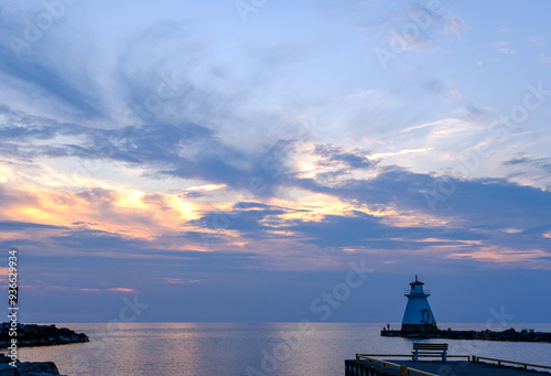 Lighthouse on the pier at sunset Southampton Front Range Light Beacon Station photo