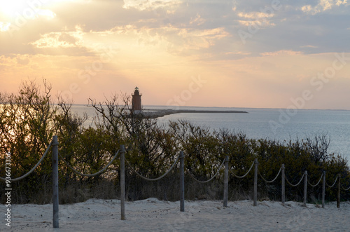 Delaware Breakwater Lighthouse at Cape Henlopen State Park at sunset