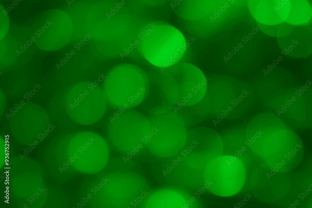 Blurred bokeh effect on a background of green tree leaves. abstract air bubbles on sunny yellow green sunny nature bokeh background. Natural green blurred background.