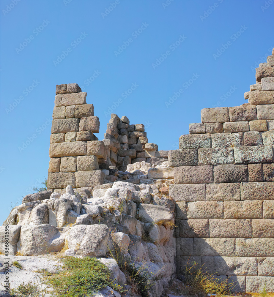 Travel, destination and ancient architecture in Greece as temple, structure and old building at site. Landmark, monument and wall with tourism, culture and stone for discovery, adventure and history Travel, destination and ancient architecture in Greece as temple, structure and old building at site. Landmark, monument and wall with tourism, culture and stone for discovery, adventure and history