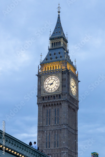 View of Big Ben time clock atop Elizabeth Tower in London, England at dusk photo