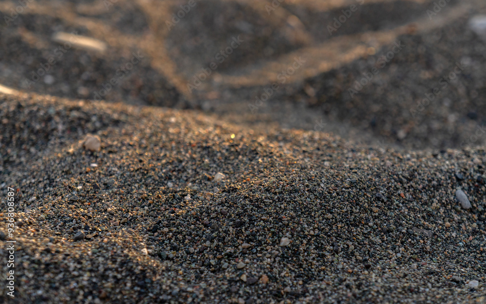 Abstract background of beach sand lit by the sun Abstract background of beach sand lit by the sun