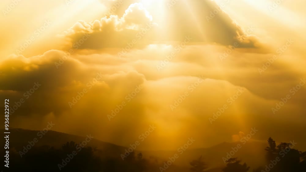 Golden hour clouds over serene hills creating a tranquil landscape in warm sunlight Golden hour clouds over serene hills creating a tranquil landscape in warm sunlight