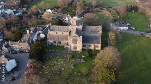 Aerial drone footage of Cartmel Village and Cartmel Priory.Cumbria UK. photo