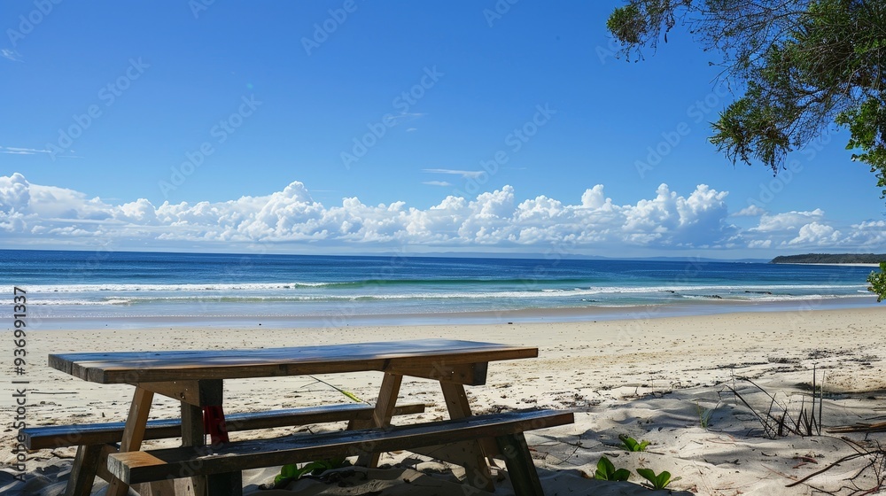 The beach is a perfect spot for a picnic, with a backdrop of sea and sky. The beach is a perfect spot for a picnic, with a backdrop of sea and sky.