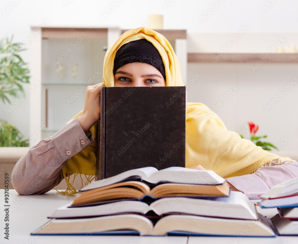 Female student in hijab preparing for exams Female student in hijab preparing for exams