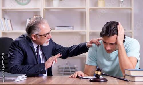 Εκτύπωση καμβά Young man visiting experienced male lawyer