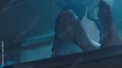 Cadaver's feet and a mortician