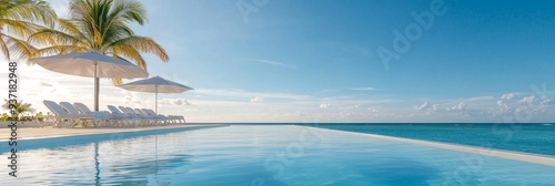 Luxury Resort Infinity Pool with Ocean Views - A tranquil scene of an infinity pool at a luxurious resort, showcasing the serene beauty of the ocean and palm trees. The crystal-clear water, comfortabl photo