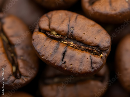 Close-up of coffee beans in a heap, focusing on the textures and rich brown colors, ideal for themes related to coffee culture and culinary arts. 