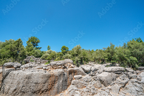 The scenic views of the ancient roman road of Selge, which was an important city in ancient Pisidia and later in Pamphylia, on the slope of Mount Taurus, Antalya, Turkey photo