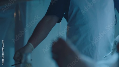 Corpse on the table and a mortician