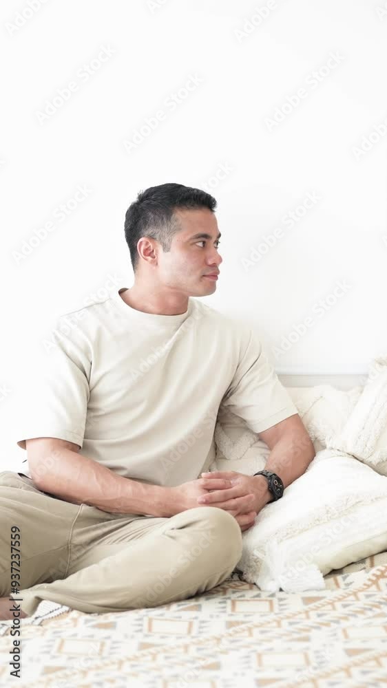 June in Selangor Malaysia Chinese Malaysian woman in her twenties and man in his thirties talking together on bed in room with stylish Western style furniture captured in slow motion vertical video June in Selangor Malaysia Chinese Malaysian woman in her twenties and man in his thirties talking together on bed in room with stylish Western style furniture captured in slow motion vertical video
