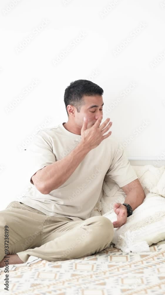 June in Selangor Malaysia Chinese Malaysian woman in her twenties and man in his thirties talking together on bed in room with stylish Western style furniture captured in slow motion vertical video June in Selangor Malaysia Chinese Malaysian woman in her twenties and man in his thirties talking together on bed in room with stylish Western style furniture captured in slow motion vertical video