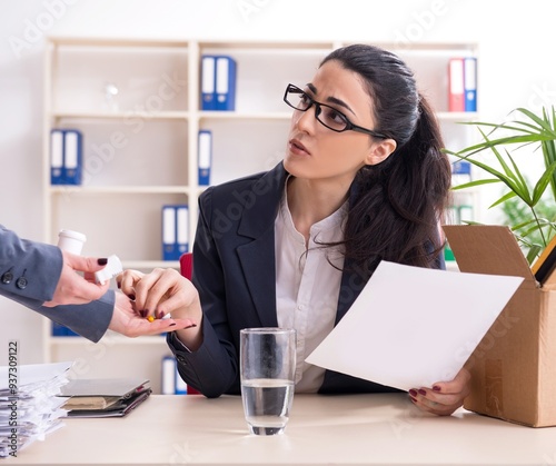 Young female employee being fired from her work