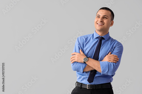 Handsome businessman on lig...