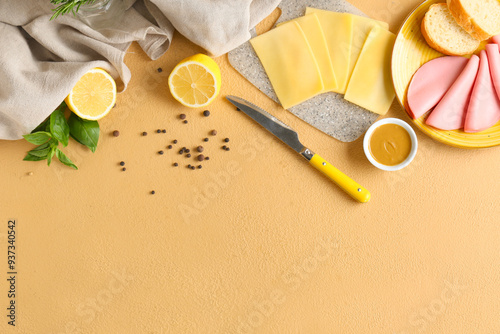 Plate with slices of tasty boiled sausage, bread, cheese and mustard sauce on beige background