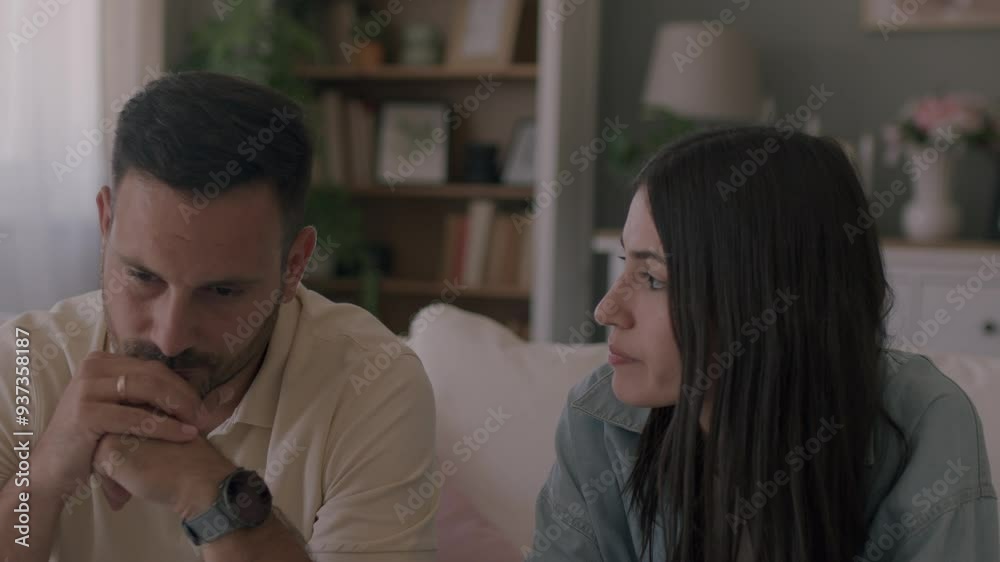Mid aged couple having a counseling session with a therapist at home. 4K video