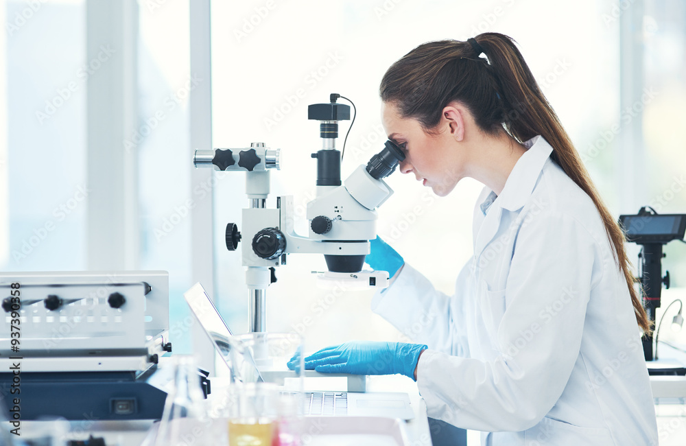 Woman, scientist and microscope at laboratory for bacteria with medical research, investigation and development. Male person, lab coat and serious with testing for virus, disease and illness