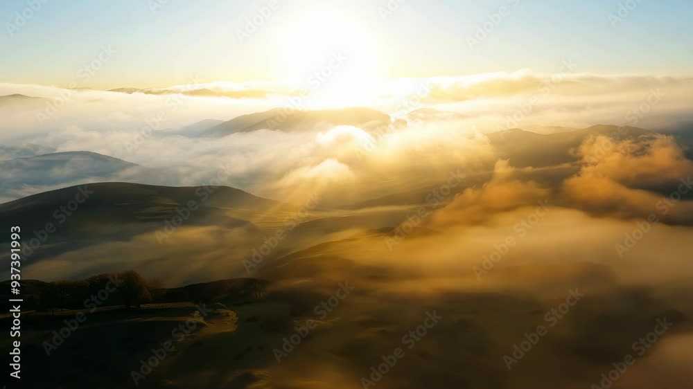 Breathtaking sunrise over misty mountains at dawn in a serene landscape Breathtaking sunrise over misty mountains at dawn in a serene landscape