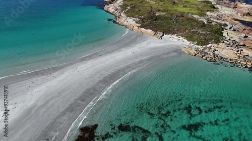 Wallpaper Mural People arriving famous Diamond Island in Tasmania after walk over sandy path between clear ocean water. TIlt up wide shot scene in summer. Torontodigital.ca