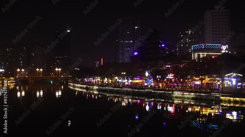 City lights reflecting on the river at night City lights reflecting on the river at night