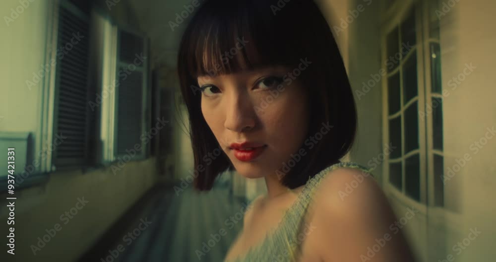 A Beautiful Asian Fashion Model Wearing a One-shoulder Top - Close Up A Beautiful Asian Fashion Model Wearing a One-shoulder Top - Close Up