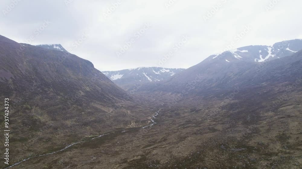 Valley in between swamp lands of Scotland, aerial drone shot with river Valley in between swamp lands of Scotland, aerial drone shot with river