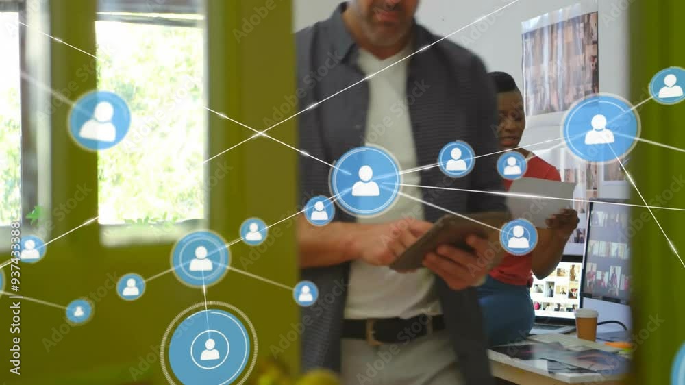 Networking icons and connections animation over business person using tablet