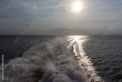 A water splash from the jet stream of a ferry boat creating big waves