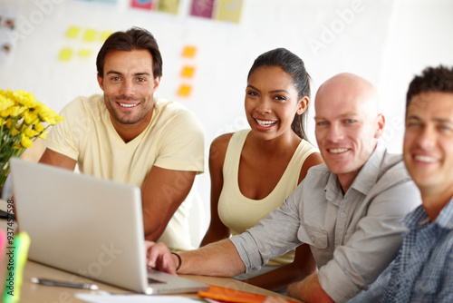 Laptop, portrait and team of business people in office for creative project feedback, review or consult. Happy, meeting and manager with public relations group for startup brand report on computer.