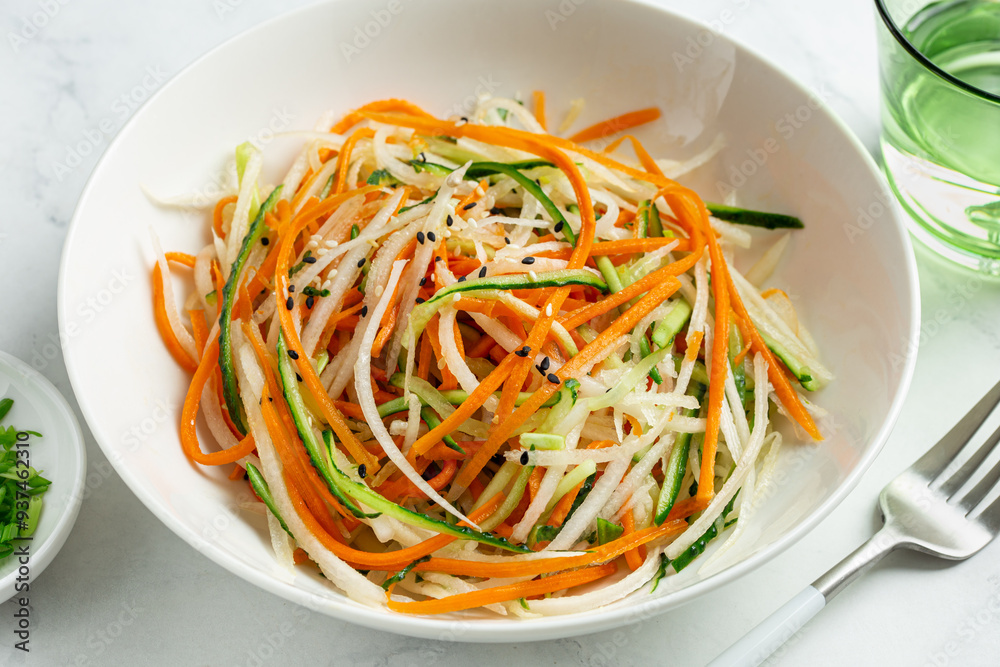 fresh and healthy cucumber, carrot and daikon radish salad fresh and healthy cucumber, carrot and daikon radish salad