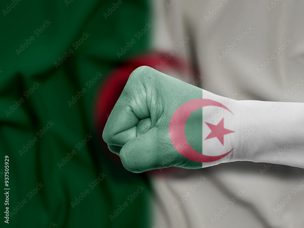 Fist of Algeria Flag Painted, Flag Painted On Hand, Multi Purpose concept Isolated on Algeria Background