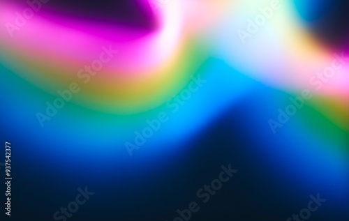 Photo of an abstract background of bright neon waves on a dark background. The dynamic and futuristic effect is ideal for modern design.