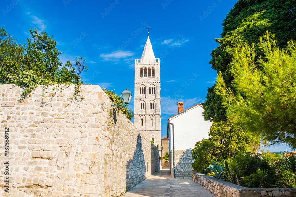 Street and cathedral tower view in town of Rab, Croatia