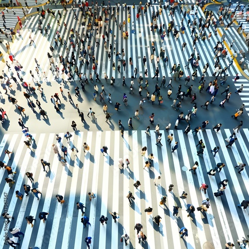 Aerial View of People Crossing Busy Street Intersection in Tokyo