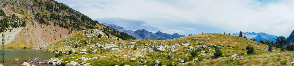 Beautiful panoramic view of a Pyrenean landscape on a cloudy day. Beautiful panoramic view of a Pyrenean landscape on a cloudy day.