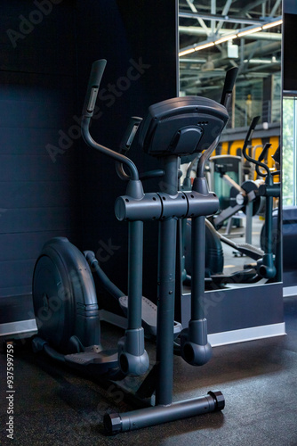 Modern fitness gym interior with sports training equipment, treadmill, no people. Backdrop of new center inventory for sport exercises workout. Sport workouts and training concept. Copy ad text space