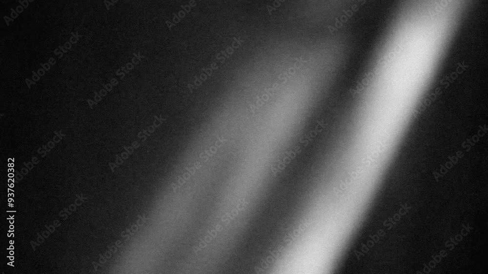 Grunge noise texture with light leaks background 4K stop motion video. Blurred backdrop loop footage with grainy effect. Monochrome black and white overlay video