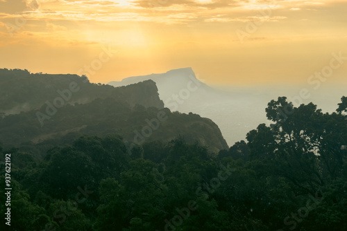 Scenic view of mountain landscapes at Mount Napak at sunset in Karamoja, Uganda
 photo