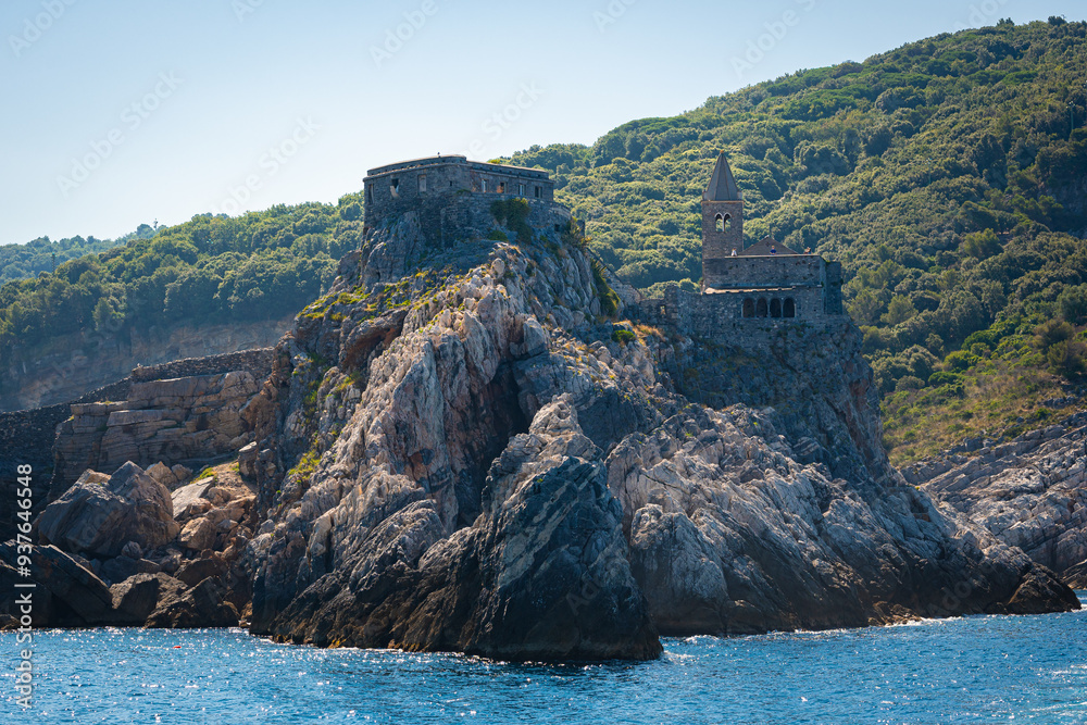Fototapeta premium Fortified church of St. Peter (Chiesa di San Pietro) on a small rocky peninsula in Porto Venere, Italy