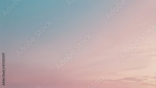 A calming blend of pastel colors fills the sky, transitioning smoothly from pink to blue, creating a tranquil atmosphere at dusk. This soft gradient invites relaxation and reflection