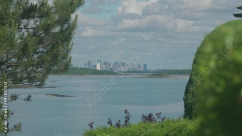 Boston city skyline as seen from across the water. Hingham, MA, USA. photo