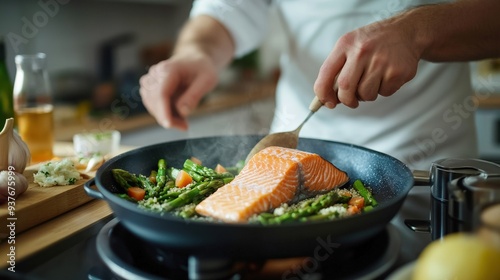 Person cooking a healthy dinner, with fresh ingredients like salmon, asparagus, and quinoa