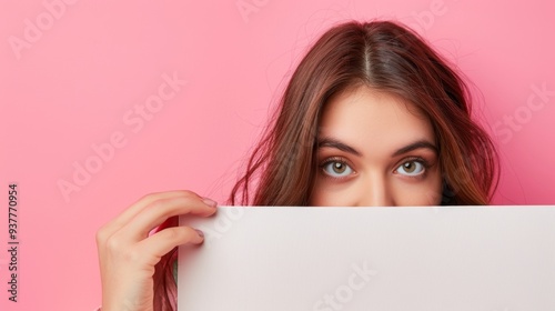 News Wall, positive childish playful girlfriend head face hide behind empty blank space isolated on pink color background