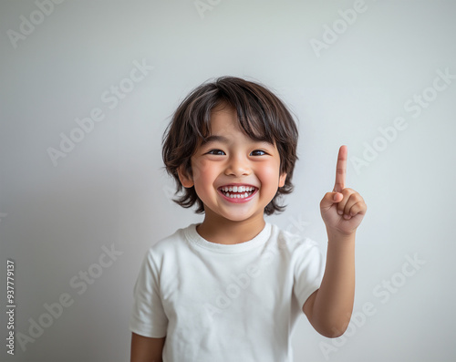 Gun finger gesture, cheerful boy