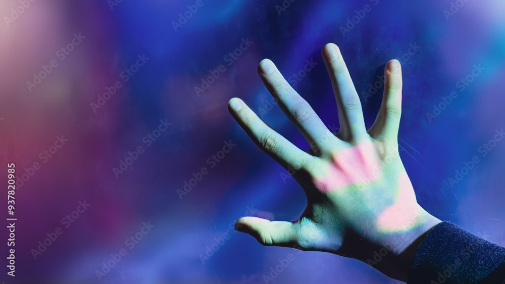 Mystical backdrop with outstretched hand illuminated by eerie lights against dark blue, smoky background, creating sense of suspense and mystery. Concept of Halloween, horror, and supernatural themes Mystical backdrop with outstretched hand illuminated by eerie lights against dark blue, smoky background, creating sense of suspense and mystery. Concept of Halloween, horror, and supernatural themes